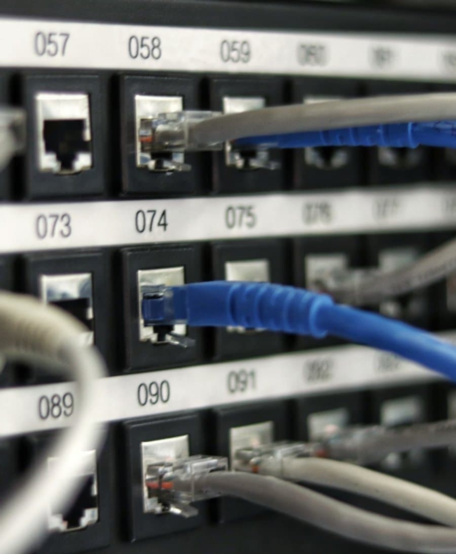 Network patch panel with structured cabling in a business server rack